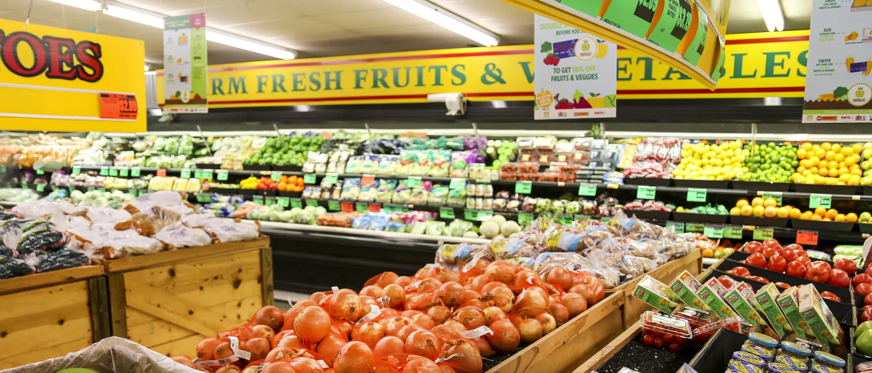 Produce and packaged goods on display in a US grocery store